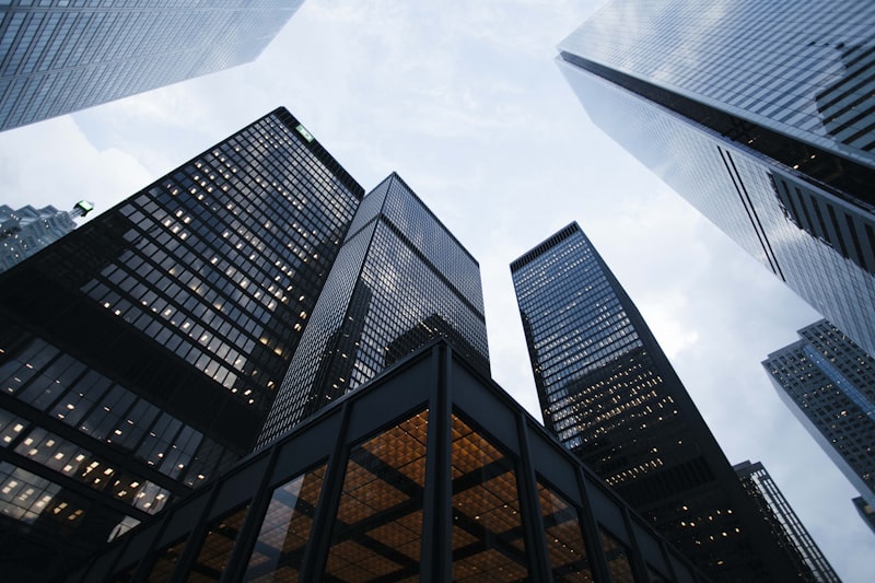 Skyscrapers against cloudy sky, modern city architecture